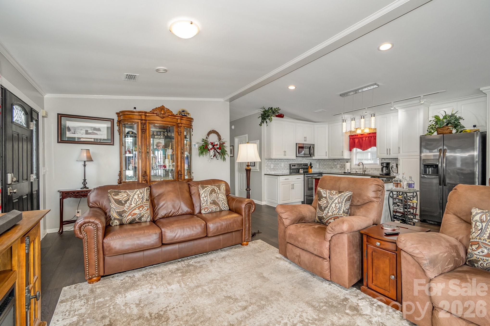 141 Badin Lake Road New London, NC 28127 - Photo 7 of 47 a living room with furniture kitchen and a kitchen view