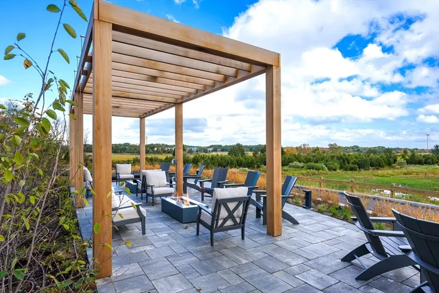 a view of a terrace with sitting area