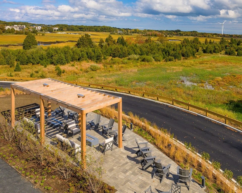 130 Chief Justice Cushing Highway, Unit 213 Scituate, MA 02066 - Photo 28 of 40 a view of an ocean from a building