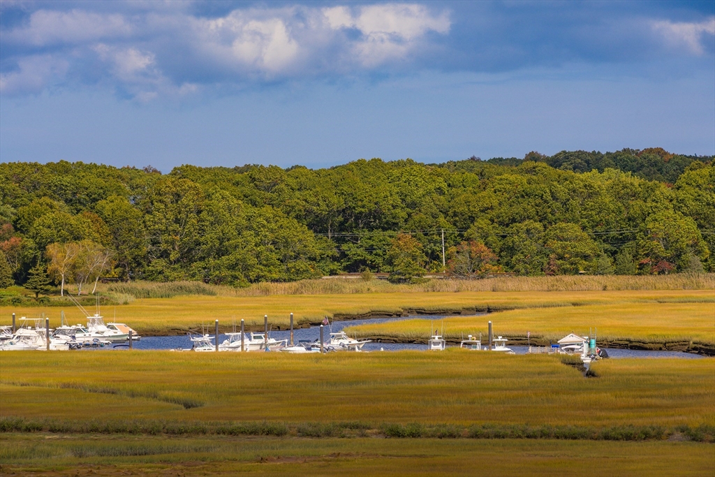 130 Chief Justice Cushing Highway, Unit 213 Scituate, MA 02066 - Photo 32 of 40 a view of an ocean and beach