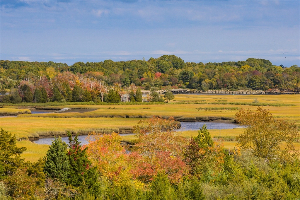 130 Chief Justice Cushing Highway, Unit 213 Scituate, MA 02066 - Photo 33 of 40 a view of an ocean and a mountain