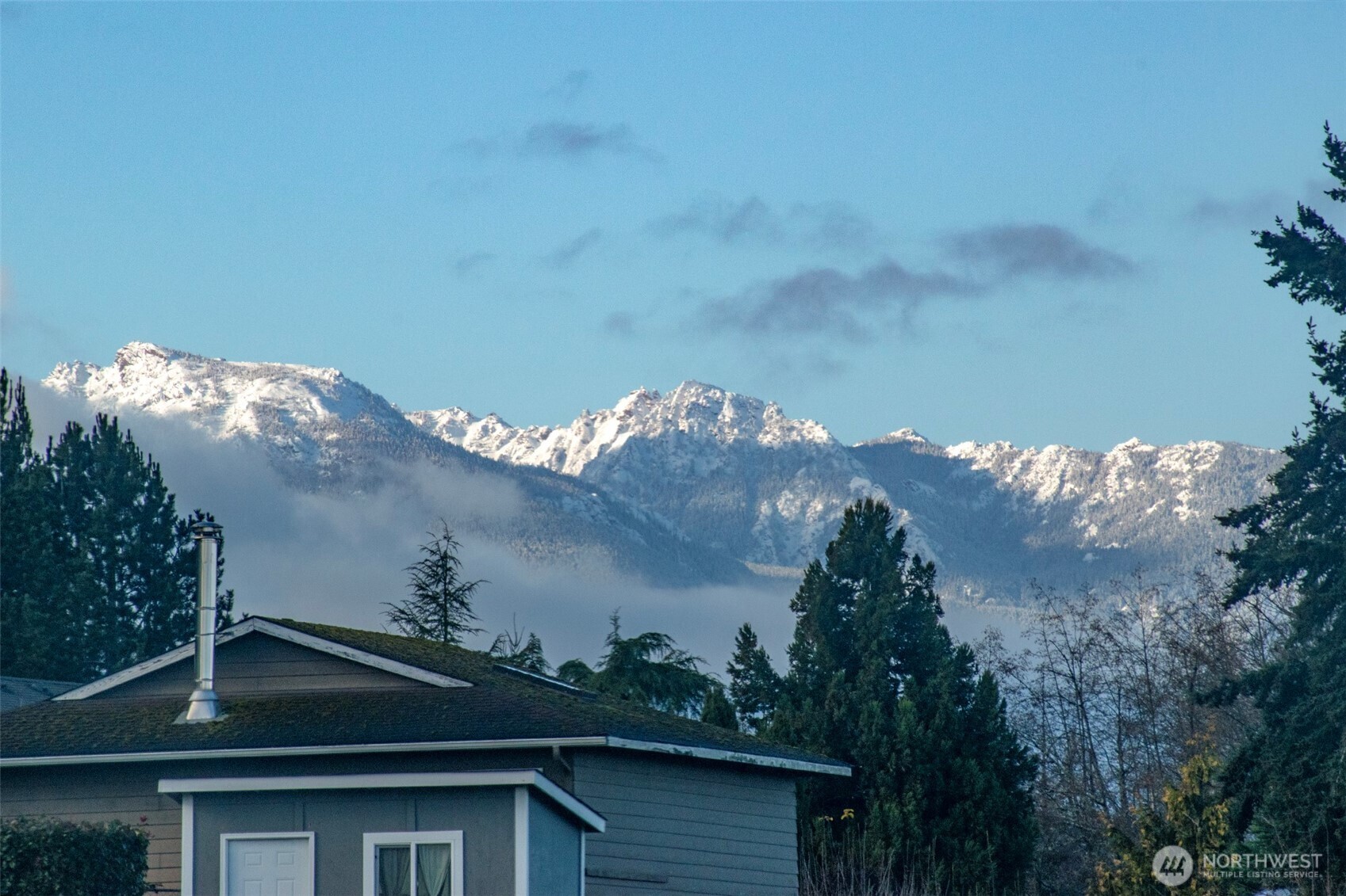 1301 South 3rd Avenue, Unit 9B Sequim, WA 98382 - Photo 2 of 39 a view of a house with a yard