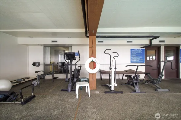 a view of a room with gym equipment