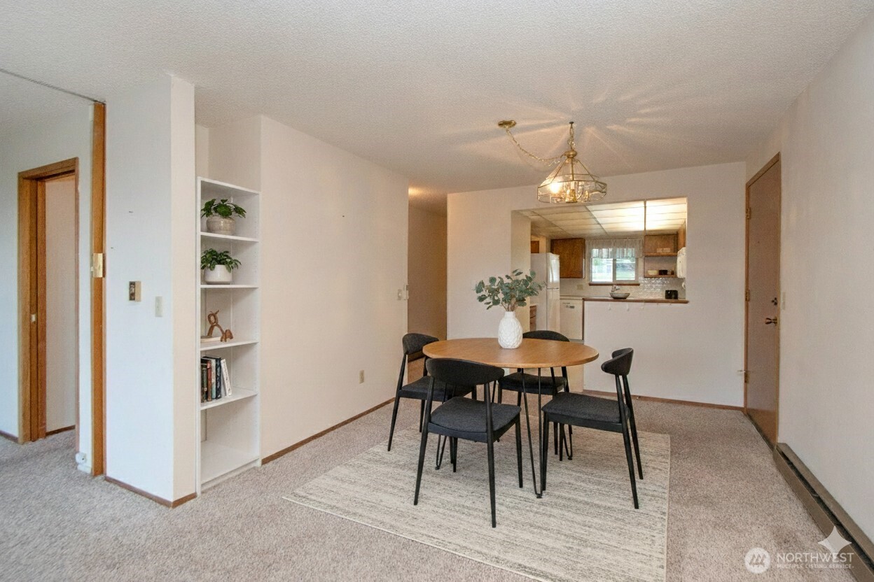 1301 South 3rd Avenue, Unit 9B Sequim, WA 98382 - Photo 8 of 39 a view of a dining room with furniture