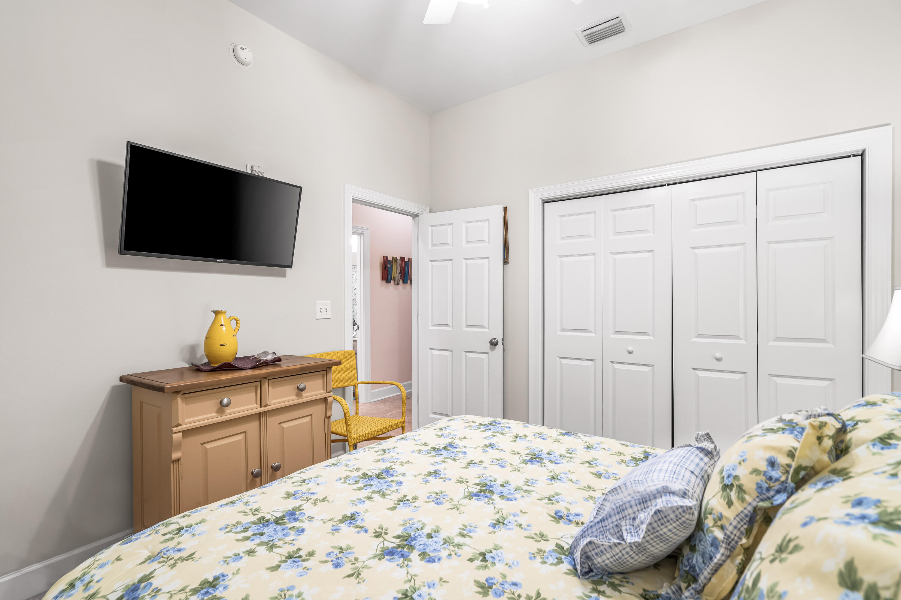 231 Somerset Bridge Road, Unit 1208 Santa Rosa Beach, FL 32459 - Photo 28 of 37 a bedroom with a bed and a flat screen tv
