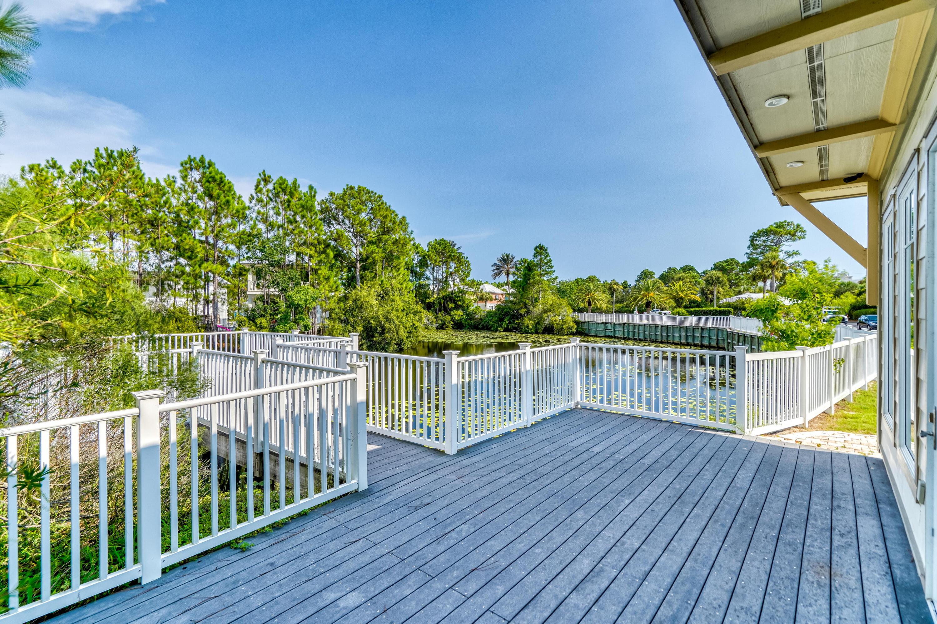 231 Somerset Bridge Road, Unit 1208 Santa Rosa Beach, FL 32459 - Photo 33 of 37 a view of a balcony with wooden floor