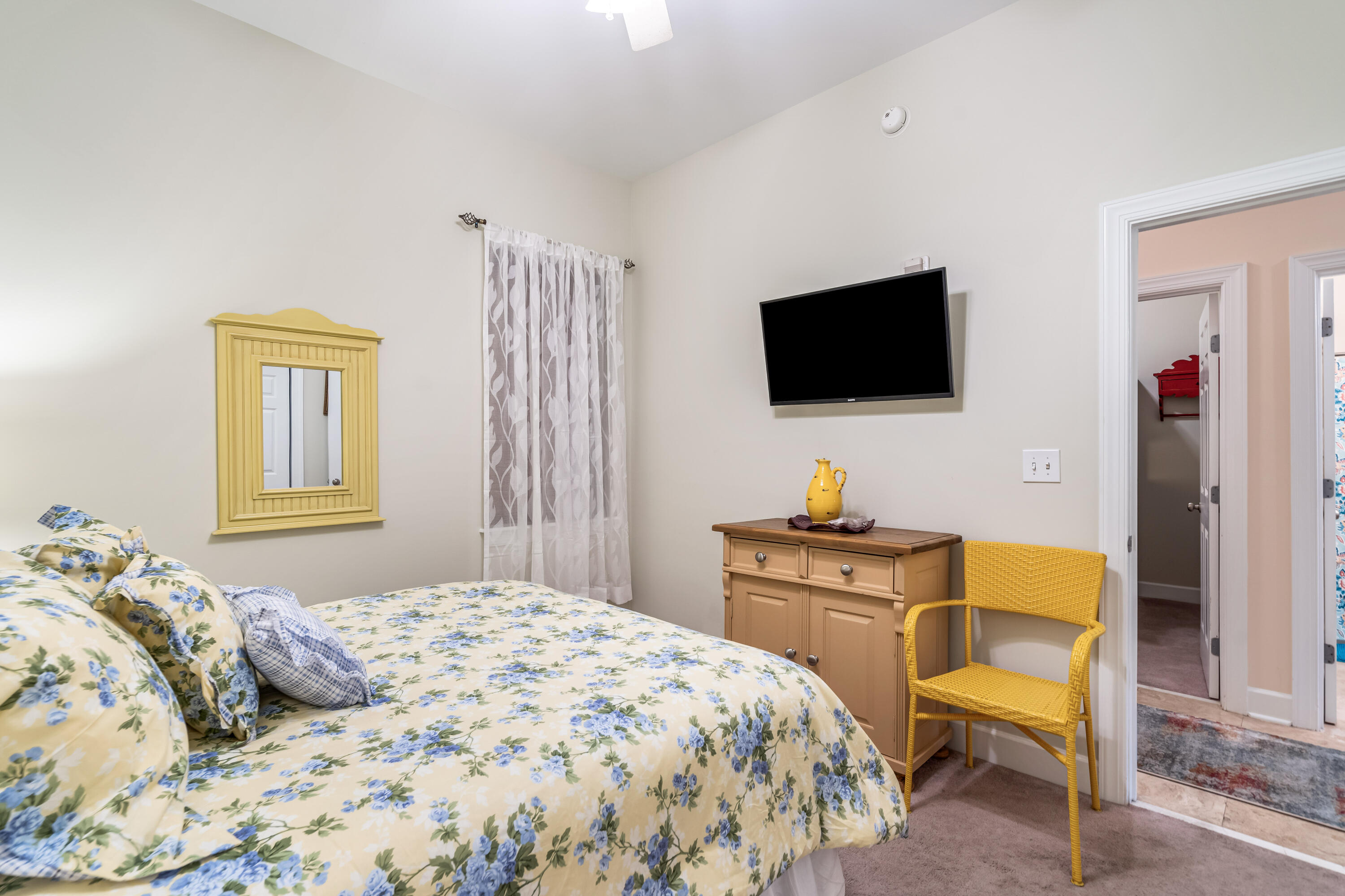 231 Somerset Bridge Road, Unit 1208 Santa Rosa Beach, FL 32459 - Photo 8 of 37 a bedroom with a bed and a flat screen tv