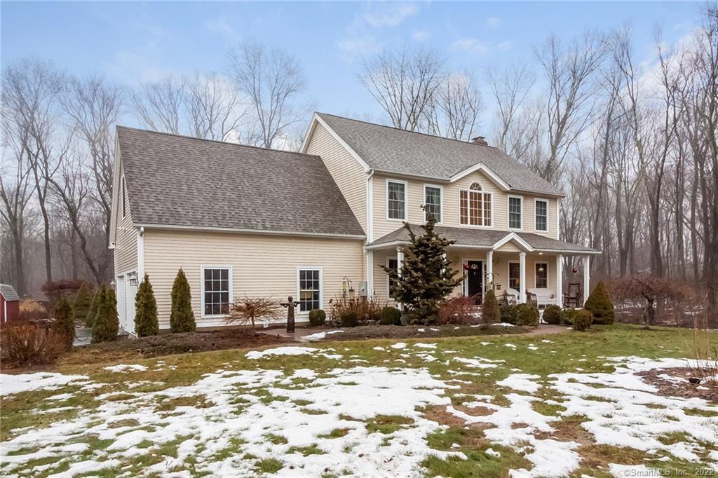 116 O'Connell Road Colchester, CT 06415 - Photo 1 of 1 a front view of a house with a yard