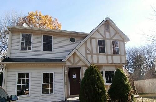 38 Sunrise Road Wolcott, CT 06716 - Photo 1 of 1 a front view of a house with a yard