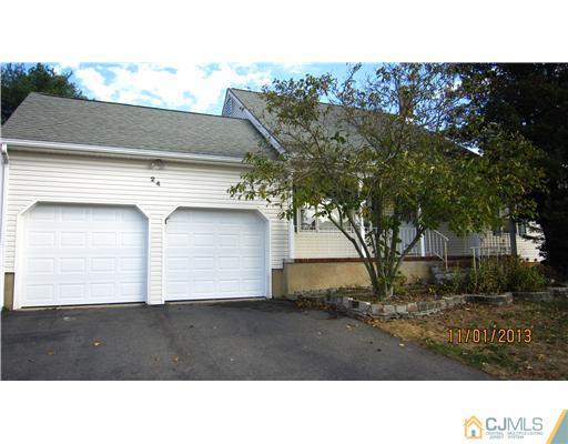 24 Roxy Avenue Edison, NJ 08820 - Photo 1 of 15 a black and white photo of a house