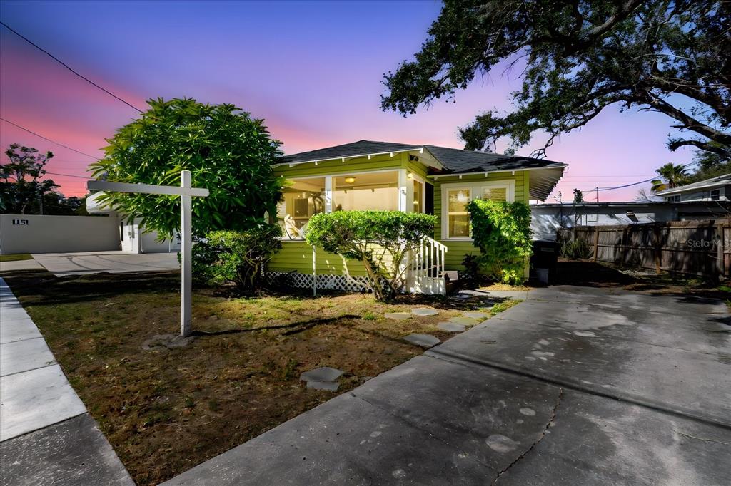 a front view of a house with a porch