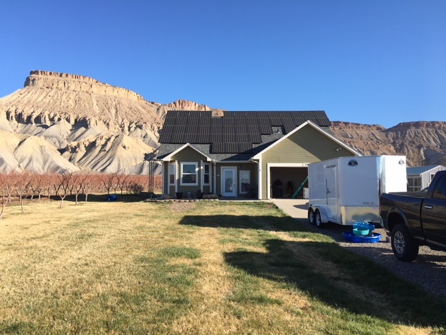 3524 G Road Palisade, CO 81526 - Photo 1 of 1 a front view of a house with a yard