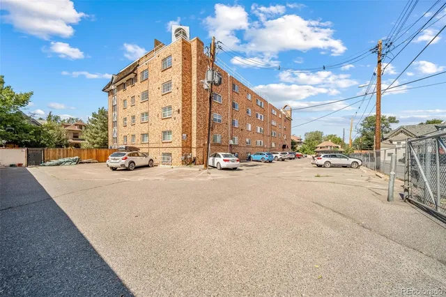 a view of a street with cars