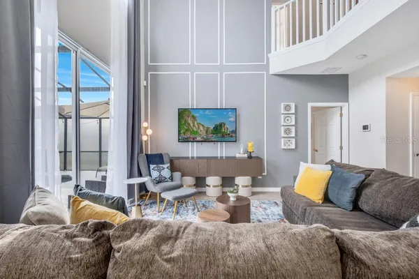 a view of a livingroom with washer and dryer