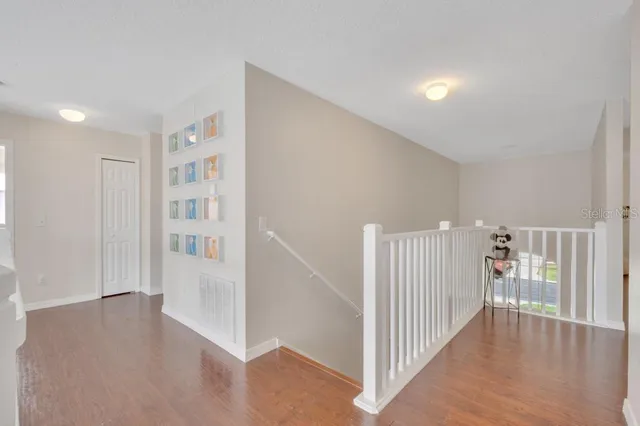 a large white bed in a white room