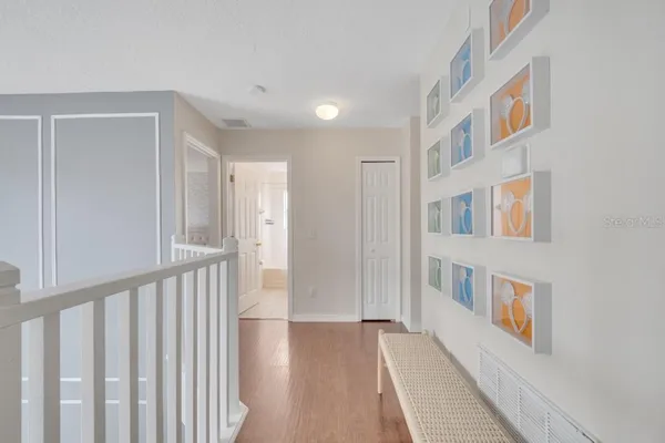a large white bed in a white room