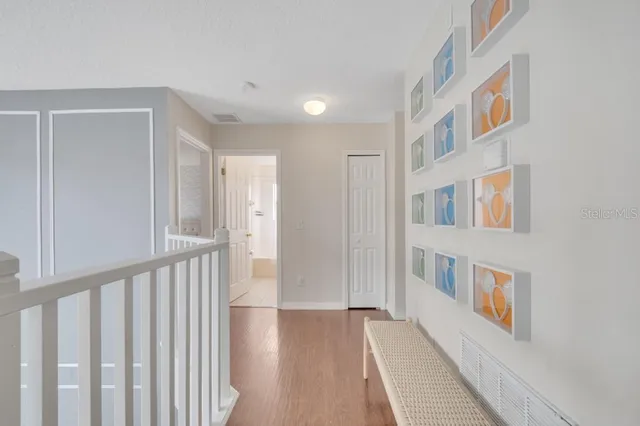 a large white bed in a white room