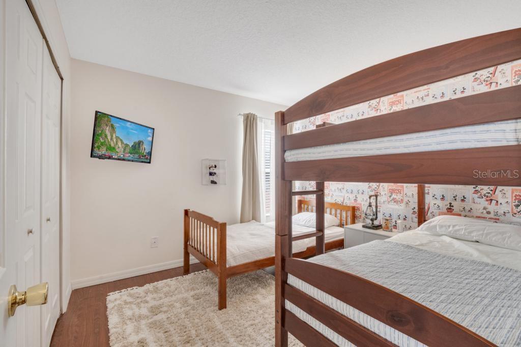 162 Cordova Avenue Davenport, FL 33897 - Photo 50 of 80 a bedroom with a bed and a window