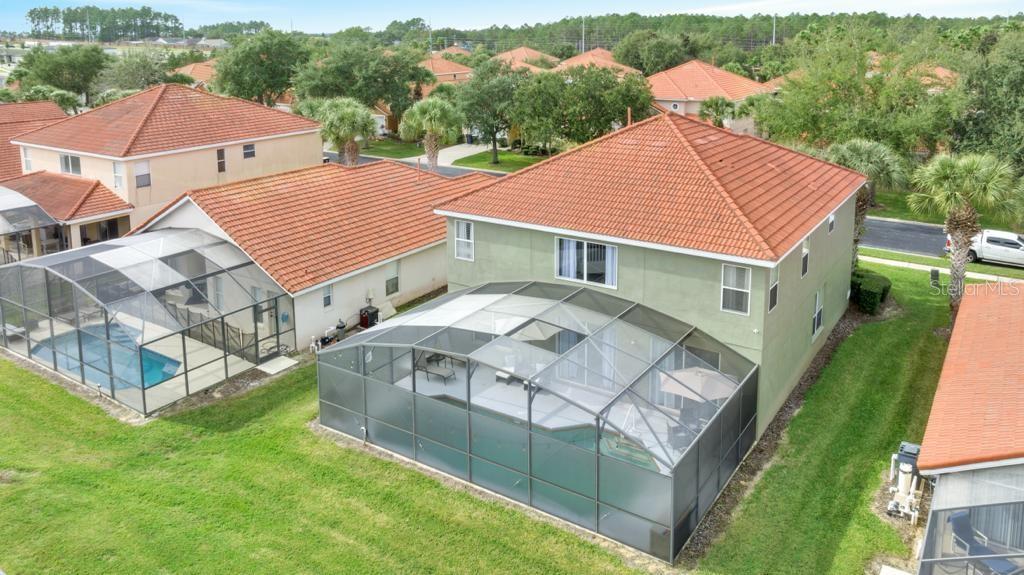 162 Cordova Avenue Davenport, FL 33897 - Photo 5 of 80 a aerial view of a house with a yard