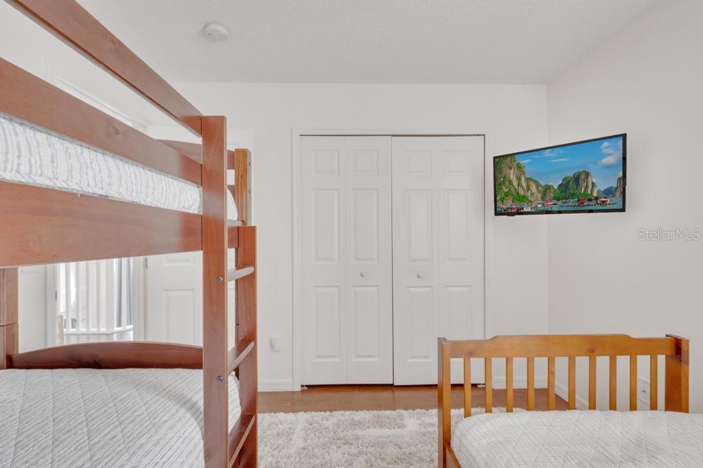 162 Cordova Avenue Davenport, FL 33897 - Photo 51 of 80 a bedroom with a bed and a window