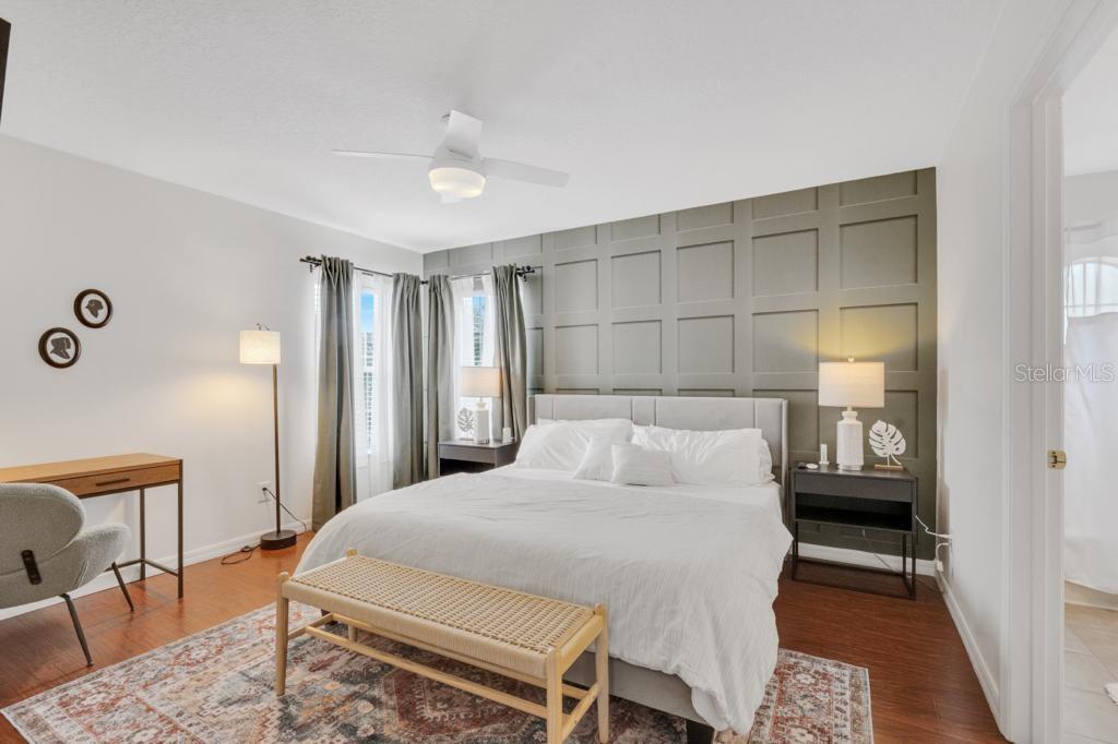 162 Cordova Avenue Davenport, FL 33897 - Photo 53 of 80 a bedroom with a bed and a table with closet