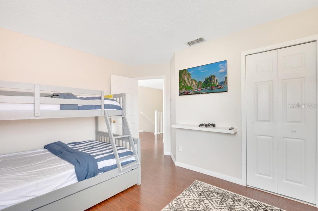 162 Cordova Avenue Davenport, FL 33897 - Photo 60 of 80 a living room with furniture and a rug