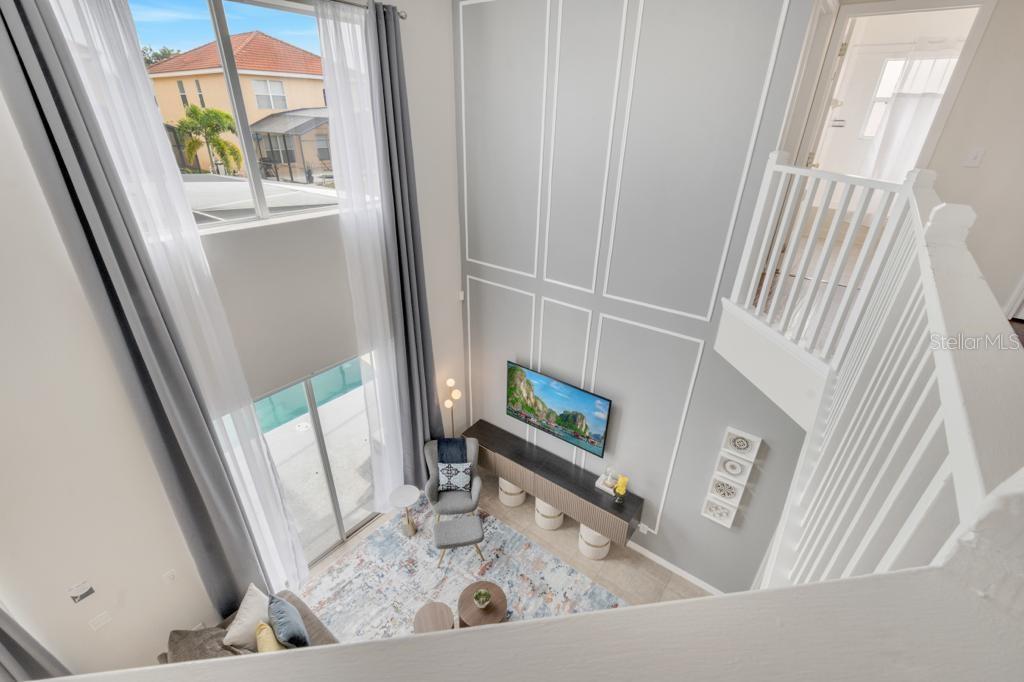 162 Cordova Avenue Davenport, FL 33897 - Photo 68 of 80 a view of living room with furniture and a window