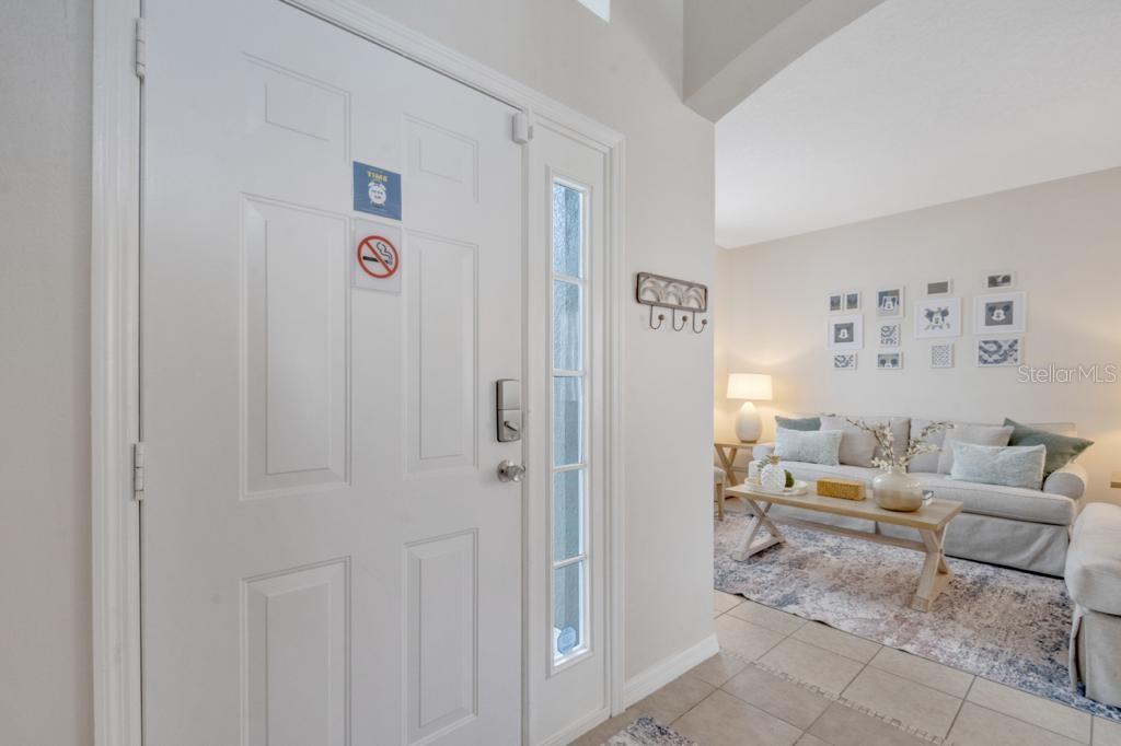 162 Cordova Avenue Davenport, FL 33897 - Photo 9 of 80 a living room with furniture and a table