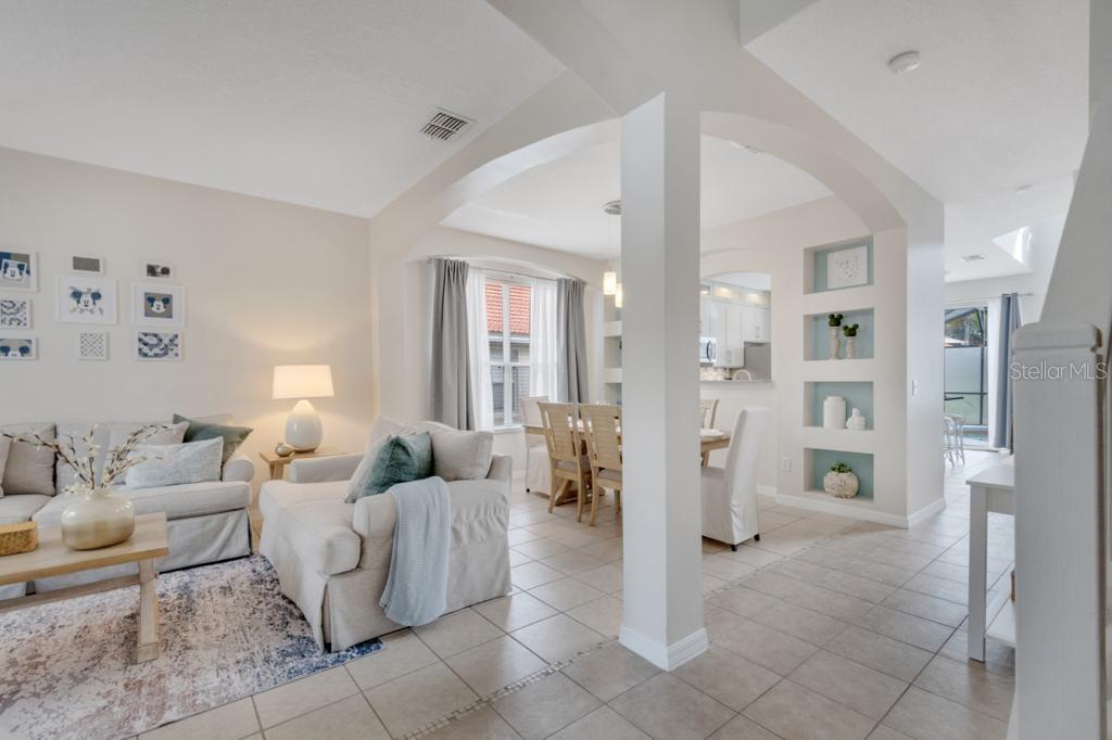 162 Cordova Avenue Davenport, FL 33897 - Photo 10 of 80 a living room with furniture and a table