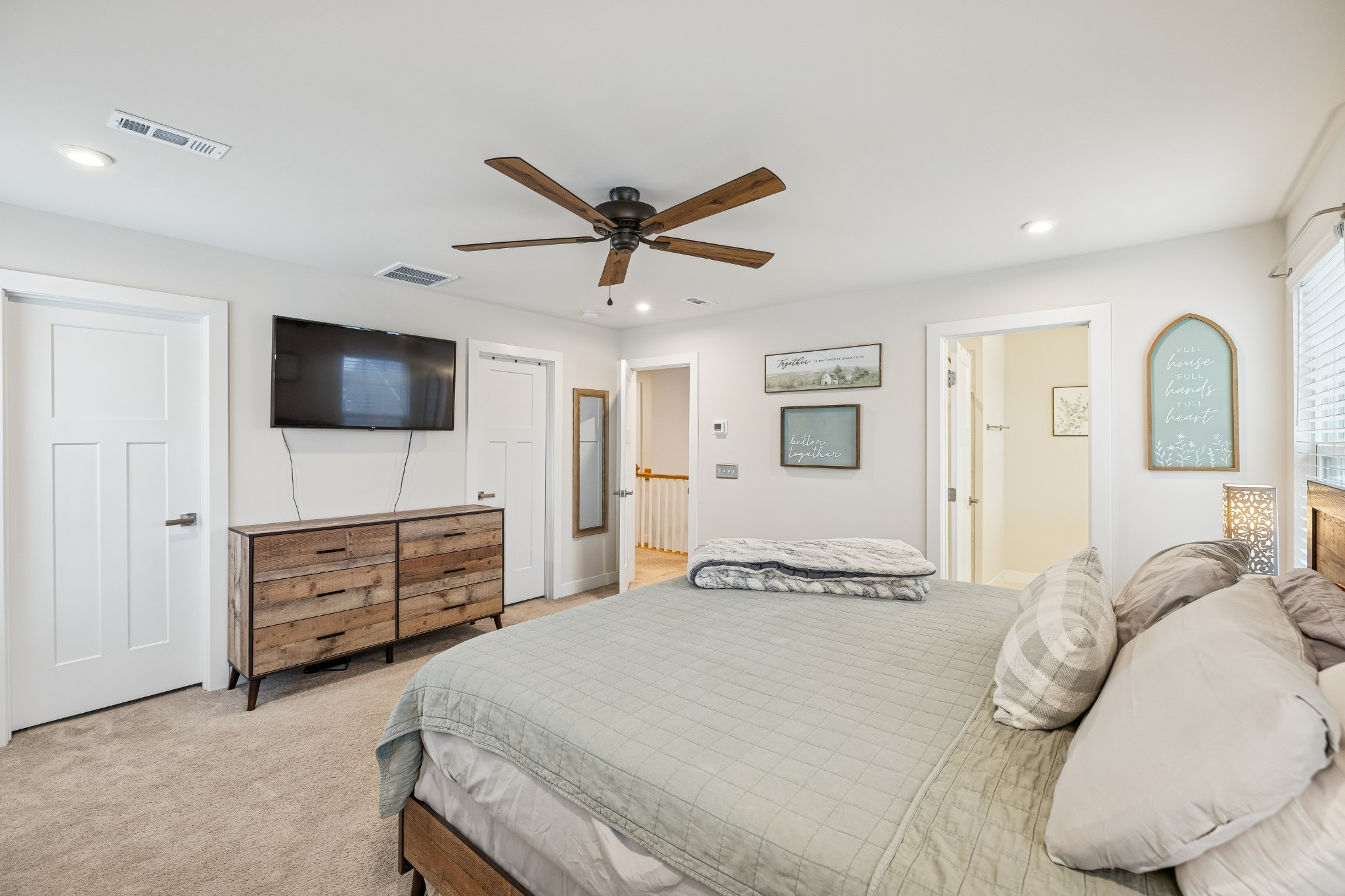 809 Mill Tree Court Smyrna, TN 37167 - Photo 21 of 42 a bedroom with a bed and a flat screen tv