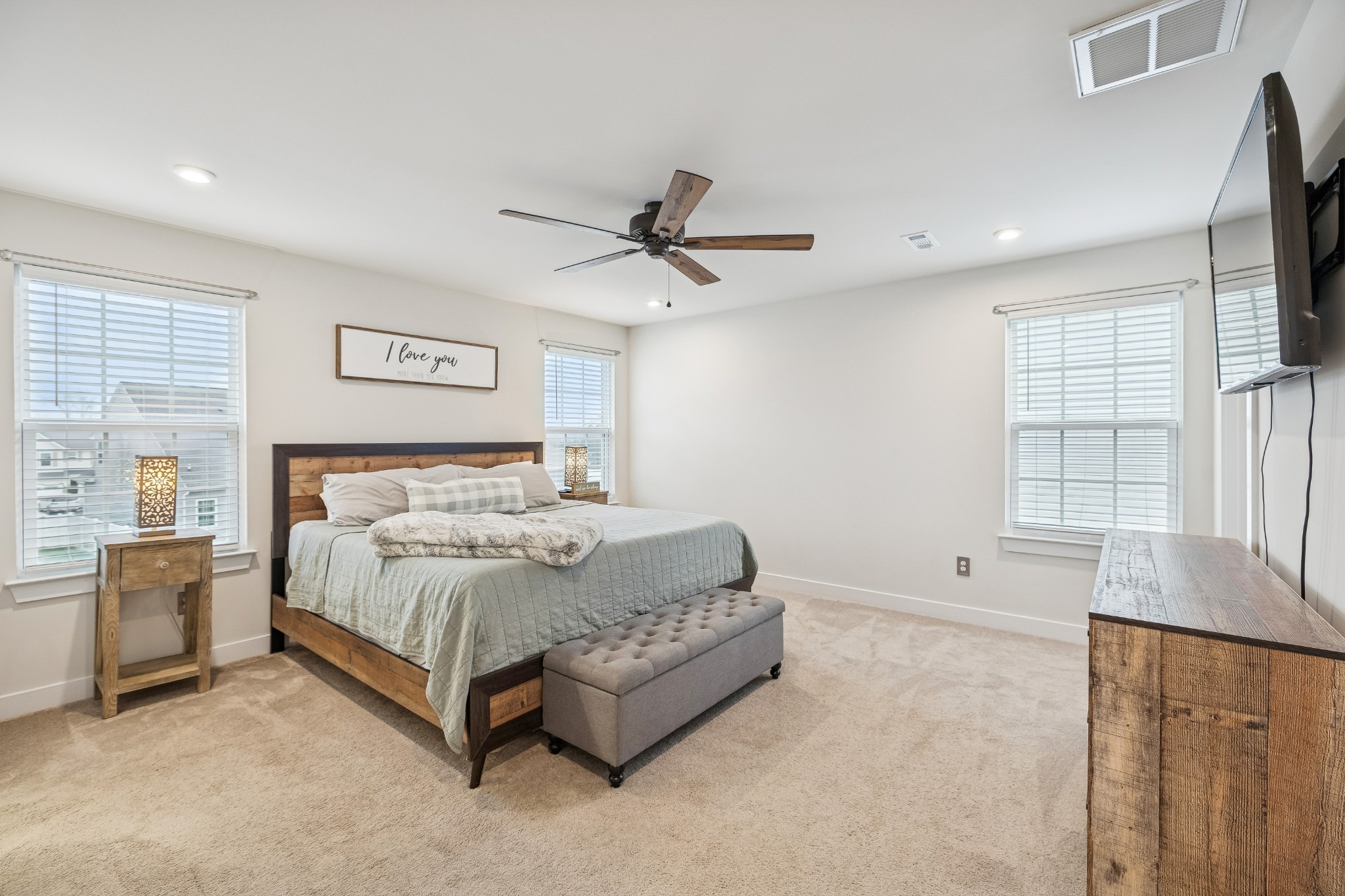809 Mill Tree Court Smyrna, TN 37167 - Photo 22 of 42 a spacious bedroom with a bed and a large window