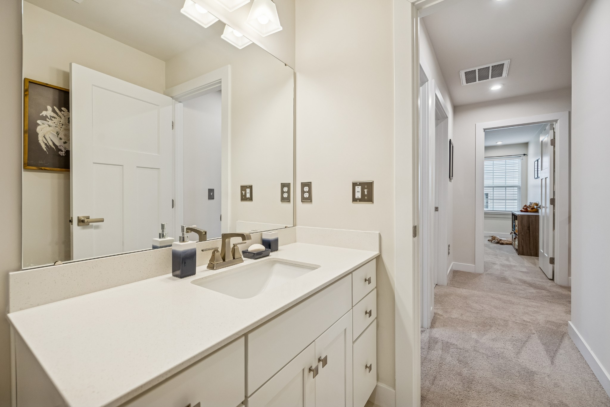 809 Mill Tree Court Smyrna, TN 37167 - Photo 28 of 42 a bathroom with a sink a vanity and a mirror