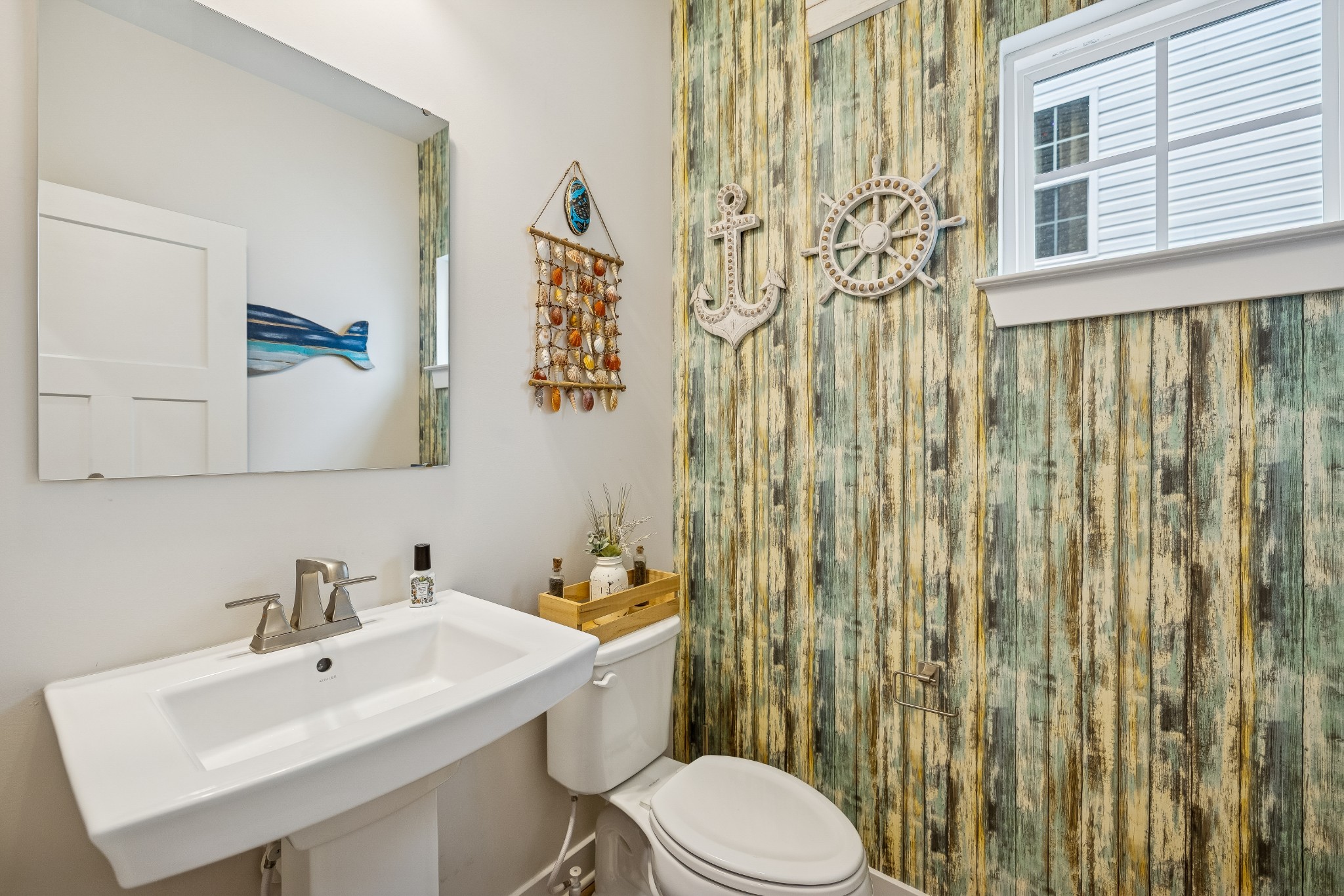 809 Mill Tree Court Smyrna, TN 37167 - Photo 32 of 42 a bathroom with a sink a toilet and shower curtain