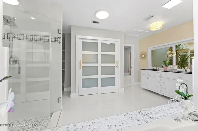 an aerial view of a house with a swimming pool yard and outdoor seating