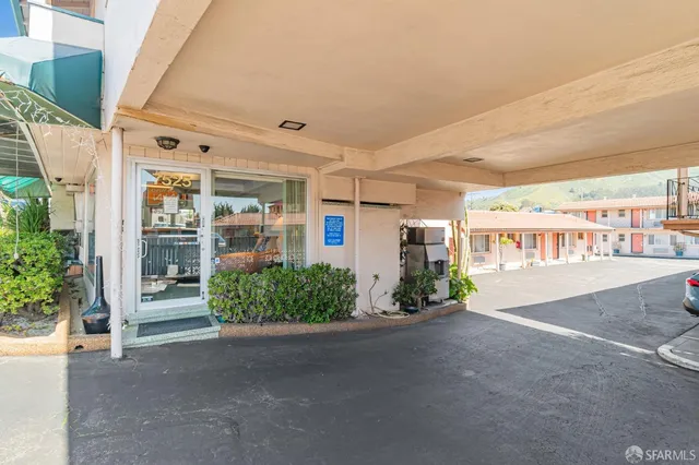 a view of a swimming pool with a lounge chairs