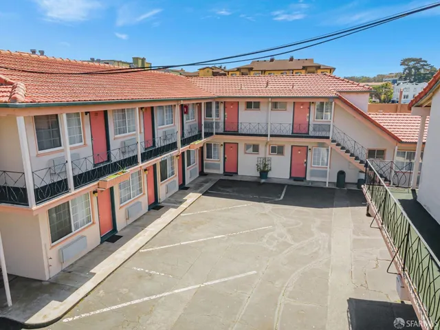 an aerial view of a house with a garden