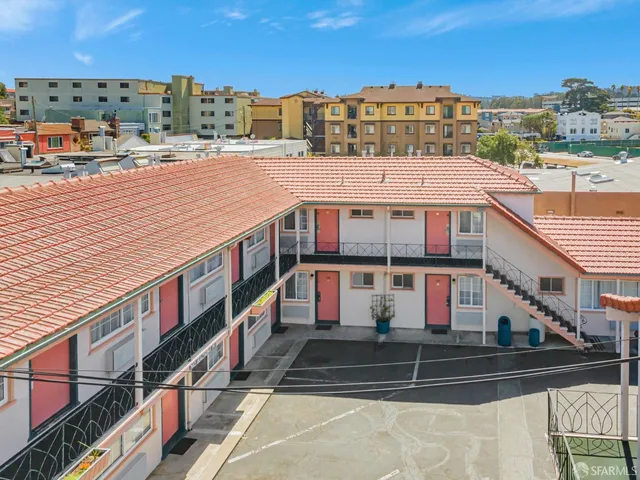 an aerial view of a house with balcony
