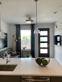 a kitchen with a sink and a window