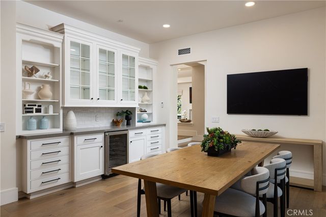 a view of a chairs and table in a patio