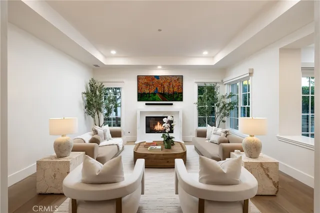 a view of a house with backyard sitting area and garden