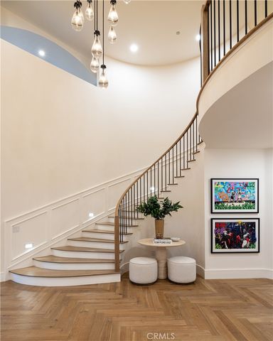 a view of a house with backyard sitting area and garden