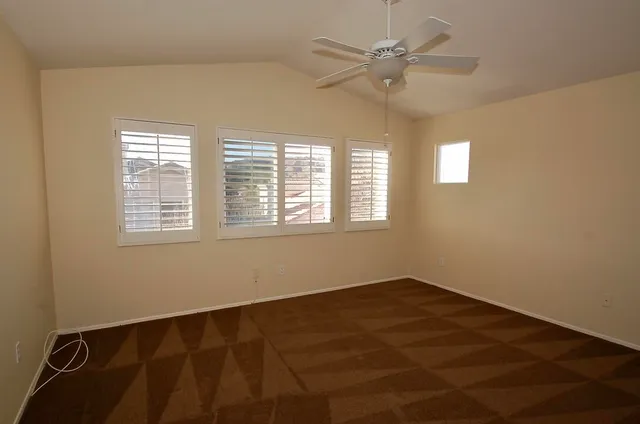 a bathroom with a tub shower and sink