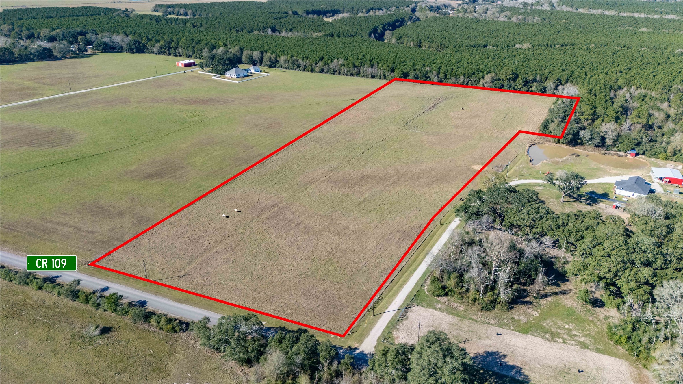 109 County Road 109 Devers, TX 77538 - Photo 2 of 8 a view of a tennis court