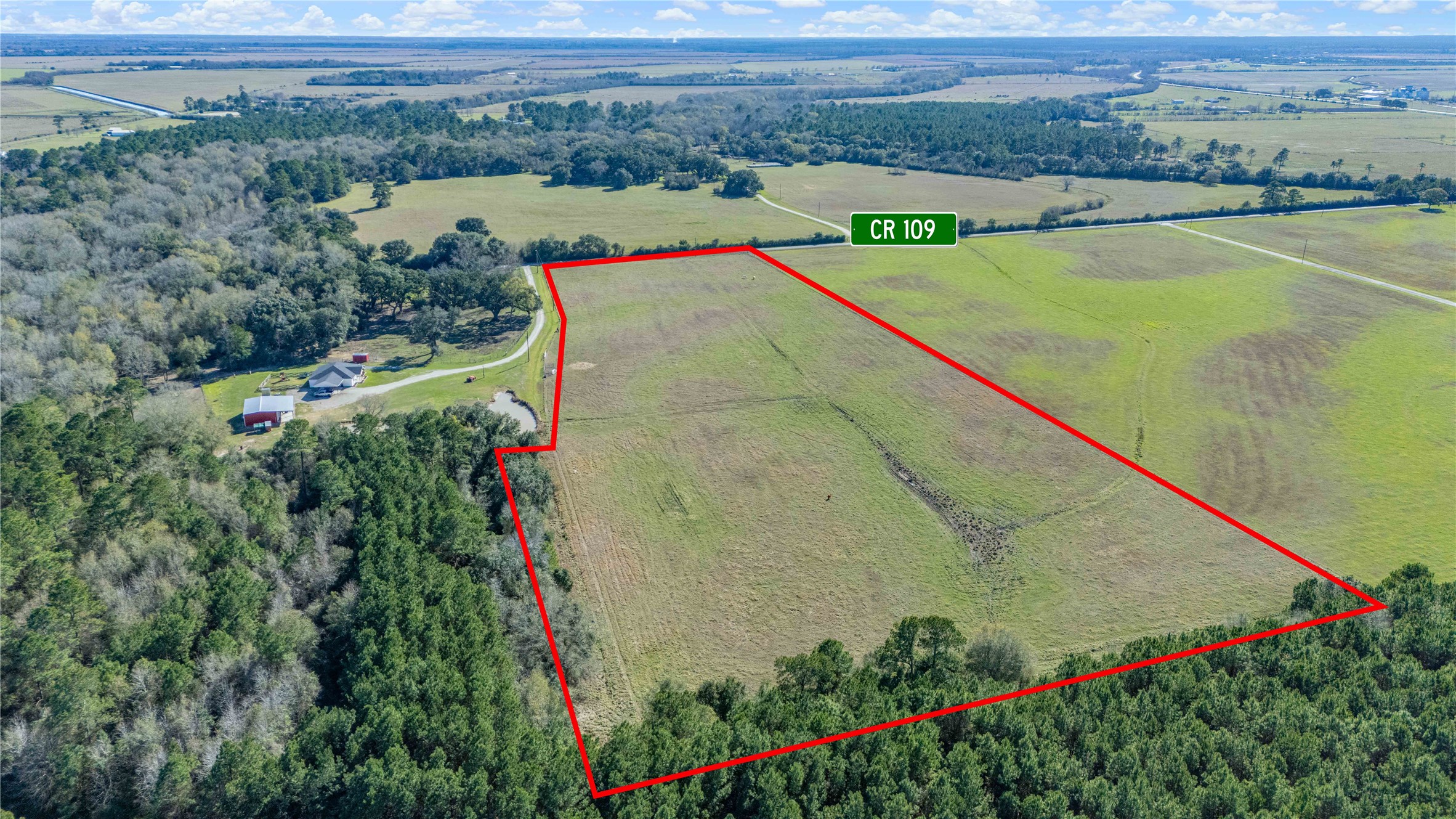 109 County Road 109 Devers, TX 77538 - Photo 4 of 8 a view of a tennis court