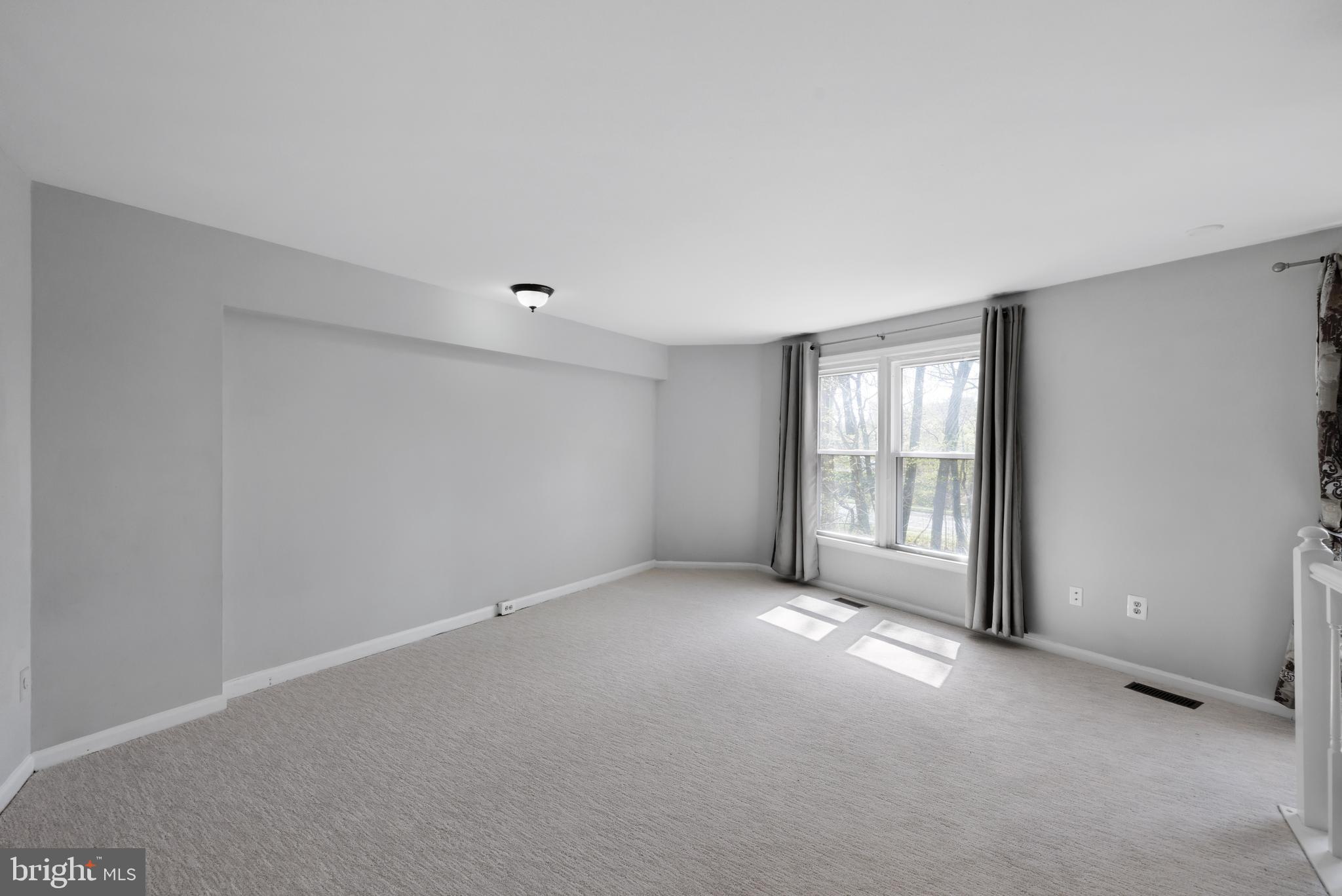 1729 Quietree Drive Reston, VA 20194 - Photo 16 of 22 a view of an empty room with a window