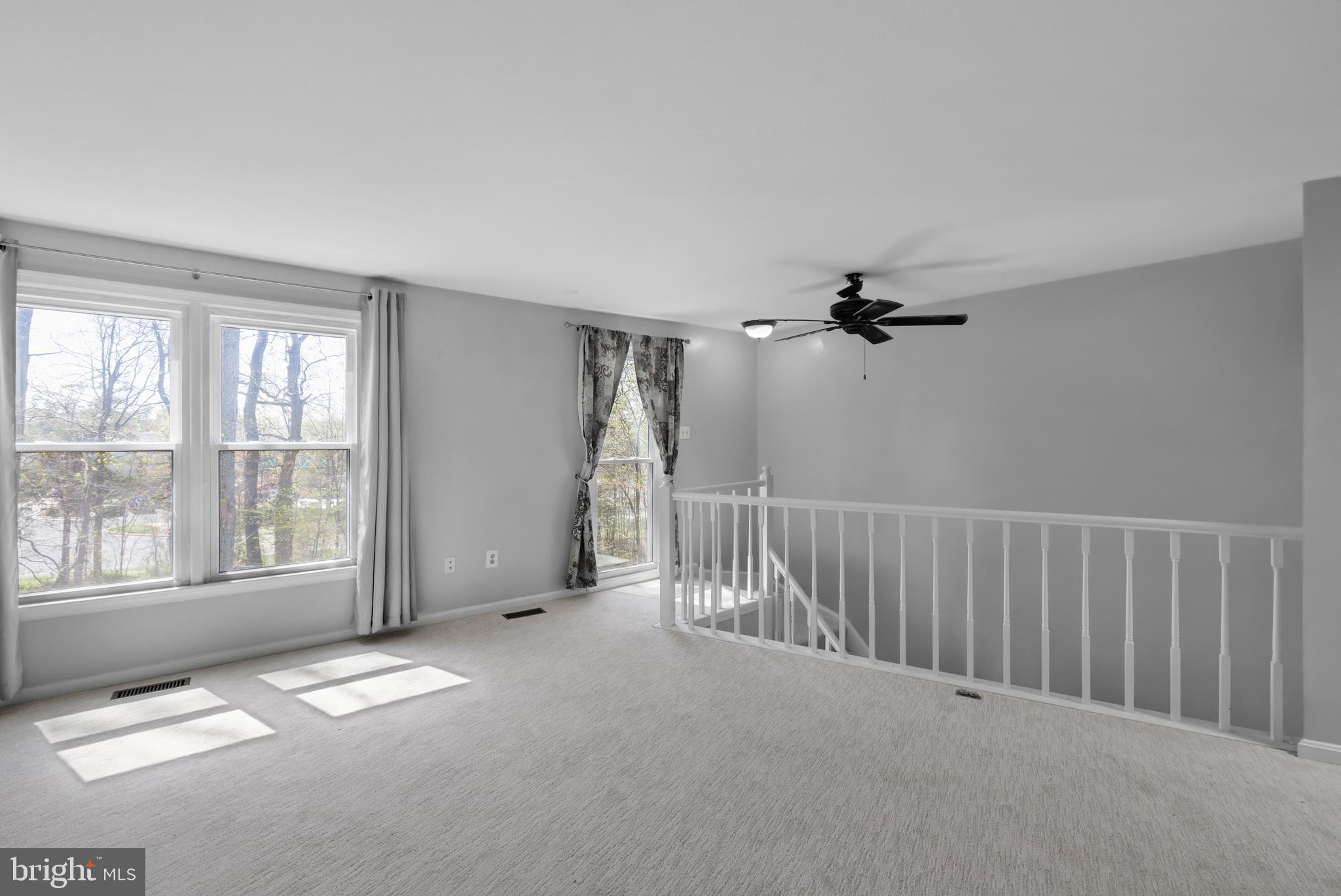 1729 Quietree Drive Reston, VA 20194 - Photo 17 of 22 a view of empty room with windows