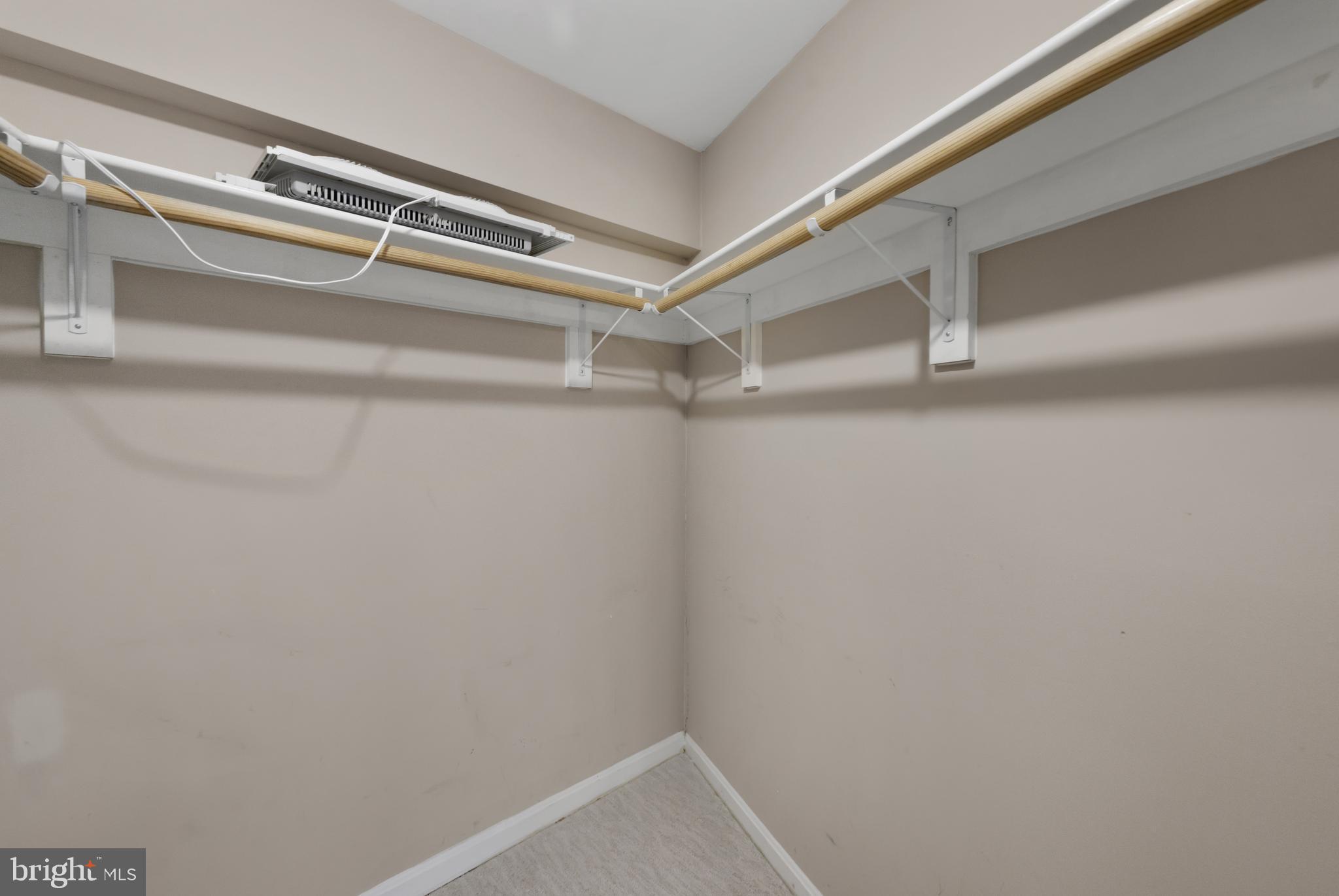 1729 Quietree Drive Reston, VA 20194 - Photo 20 of 22 a view of an empty walk in closet