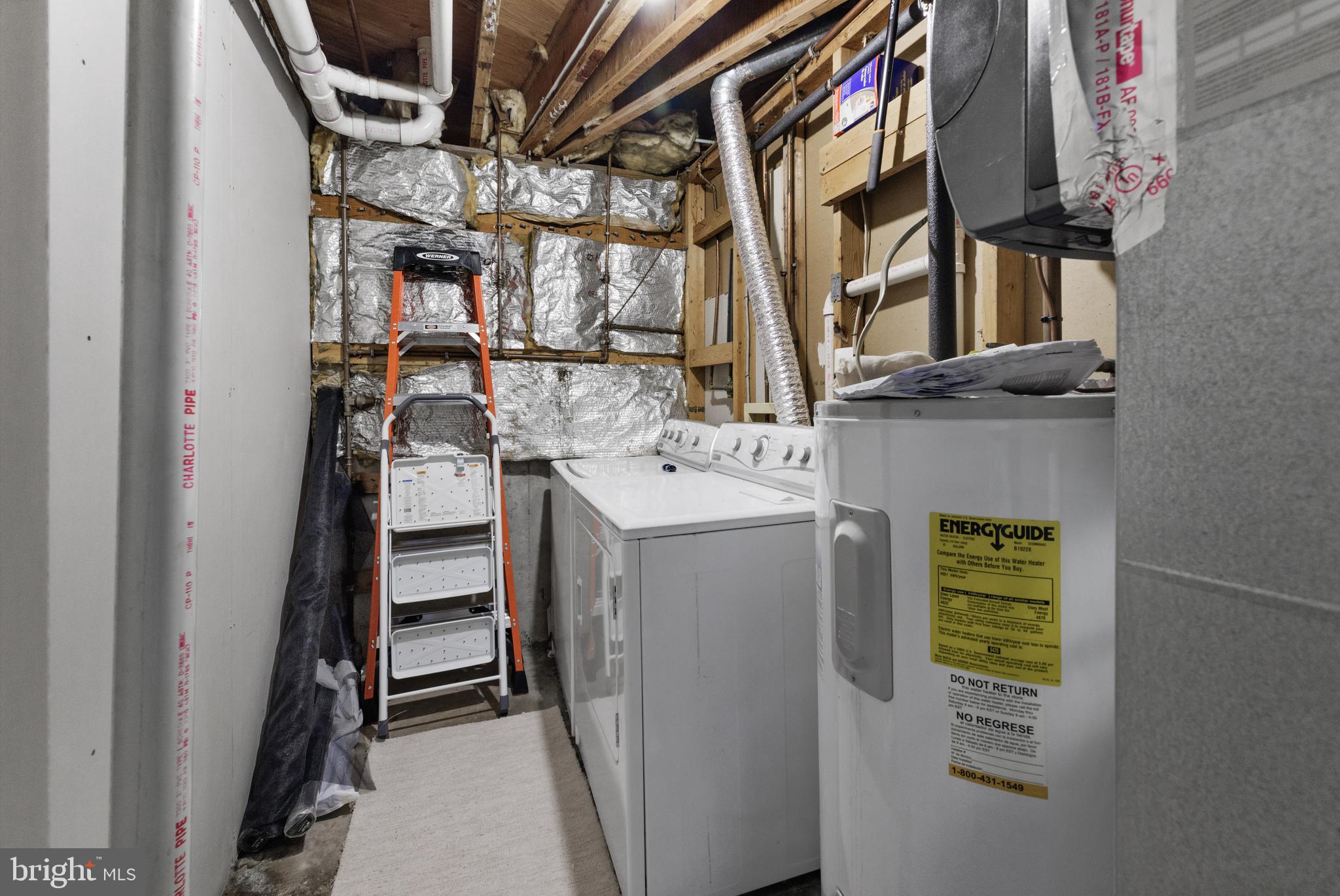 1729 Quietree Drive Reston, VA 20194 - Photo 21 of 22 a utility room with dryer and washer