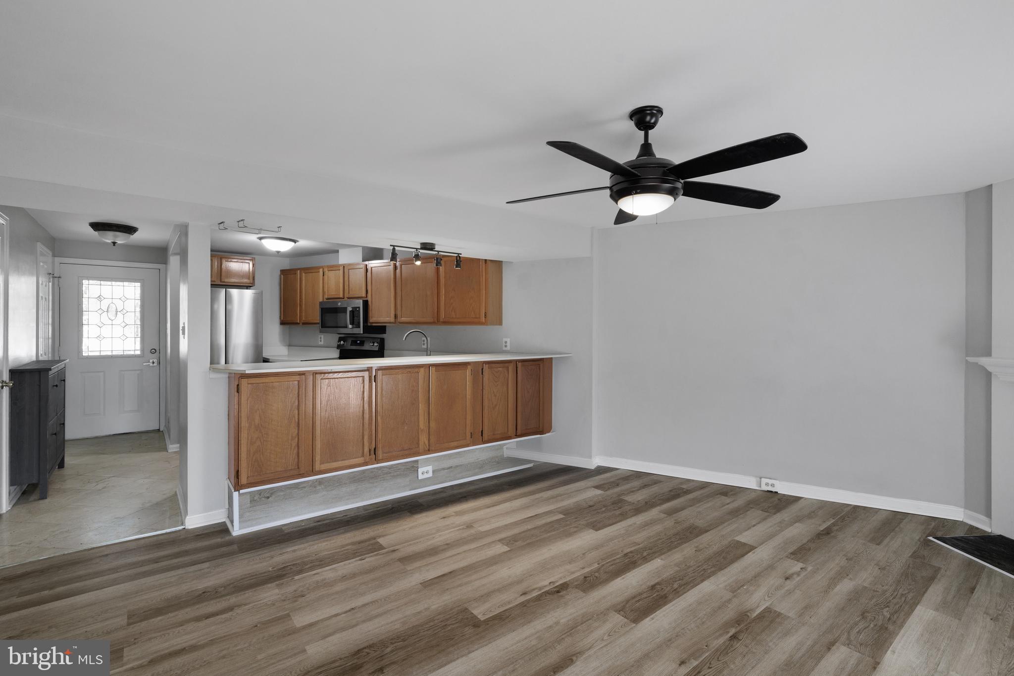 1729 Quietree Drive Reston, VA 20194 - Photo 4 of 22 a view of a kitchen with a sink and cabinet area