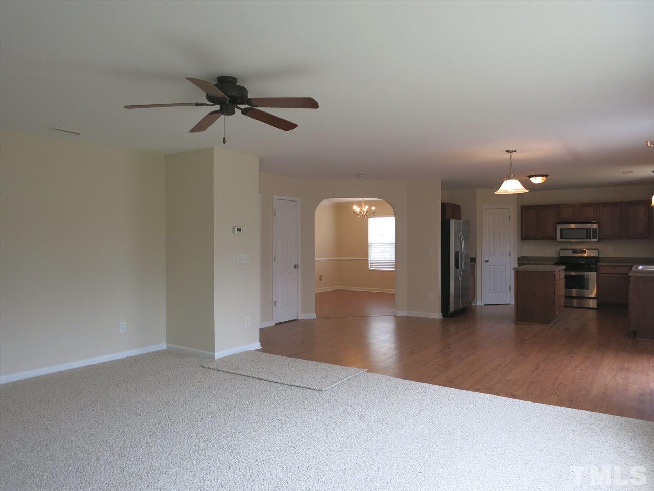 6714 Harter Court Raleigh, NC 27610 - Photo 12 of 25 Another view of the lg Family Rm which is completely open to the Kitchen & B’fast area.
